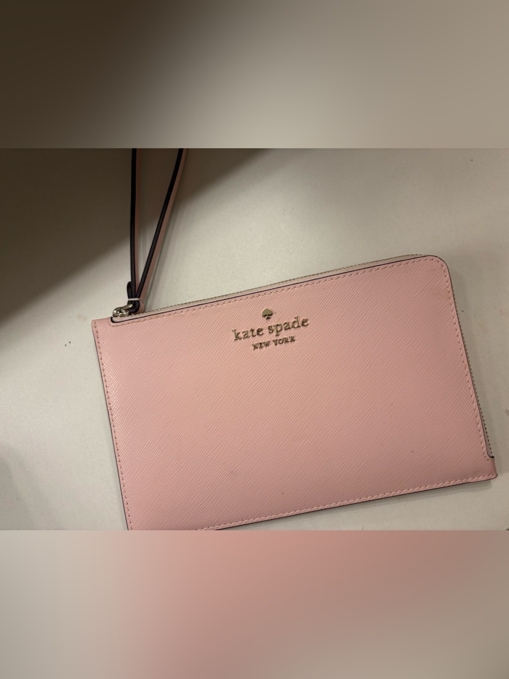 kate spade Light Pink Leather Wristlet with Gold Logo
